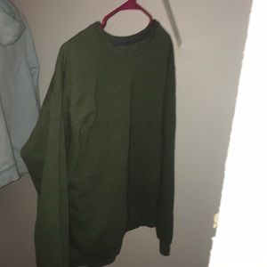 Dark green crew neck that is size large